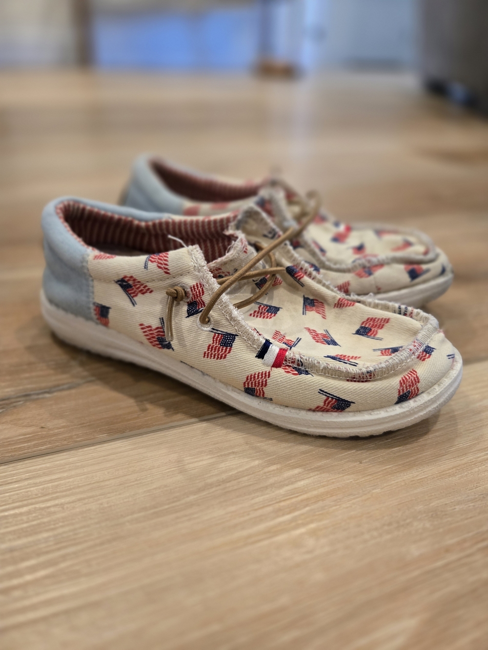 Hey Dude Kids Moccasins in Cream with Red & Blue Flag Print
